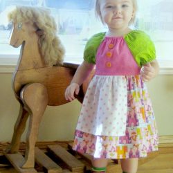 Girls Peasant Dress Pattern with Apron and sash. Easy to sew, a great beginners pattern by Whimsy Couture