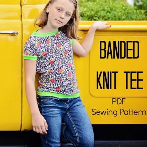 Easy to sew t-shirt sewing pattern for girls. This tee features bands on neckline, sleeves and bodice. The pattern is great for beginners.